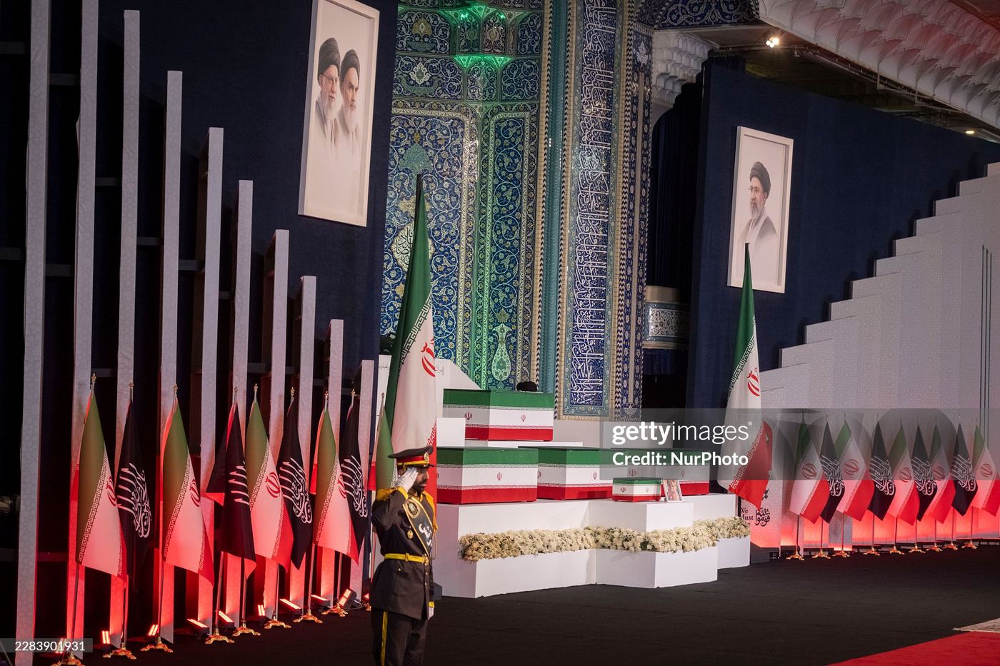 State funeral hall with flags